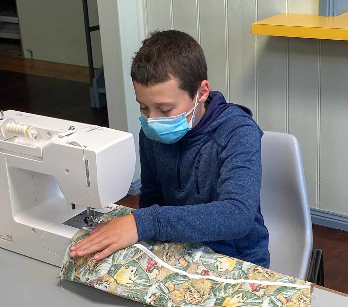 Boy at the Sewing Workshop